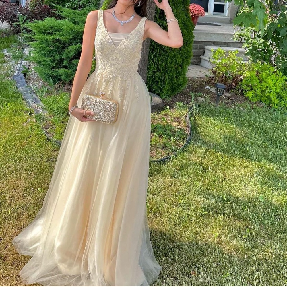 Gorgeous pale yellow prom dress
